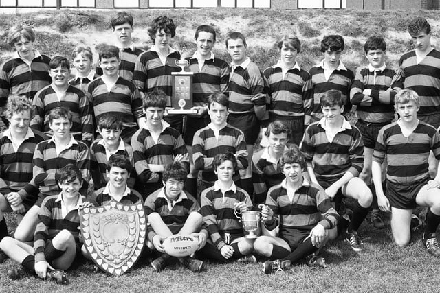 The multi trophy winning rugby league teams of St. John Fisher RC High School, Beech Hill, in May 1982. Future Wigan Rugby League star Shaun Edwards is on the 2nd row first right.