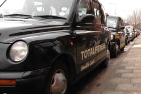 A taxi rank in Wigan town centre