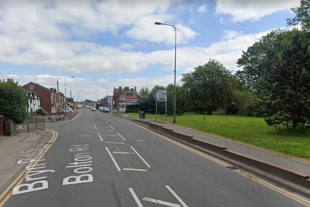 Emergency services have descended on Bolton Road, Ashton, after an incident at the junction with Bryn Road South