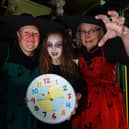 From left: Micheala Collier, Georgie Nelson, 10, and Bev Collier-Nelson at Little Buddies Play Centre, Wigan, remind you to put your clocks back an hour this Hallowe'en weekend