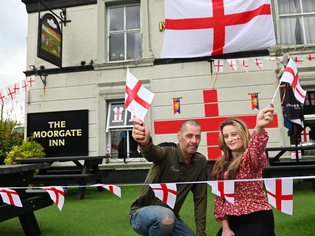 John Landon, left, landlord of The Moorgate Inn, Aspull, pictured with assistant manager Chelsea Kershaw, are getting ready to host a St George's Day party for the Royal British Legion on Saturday