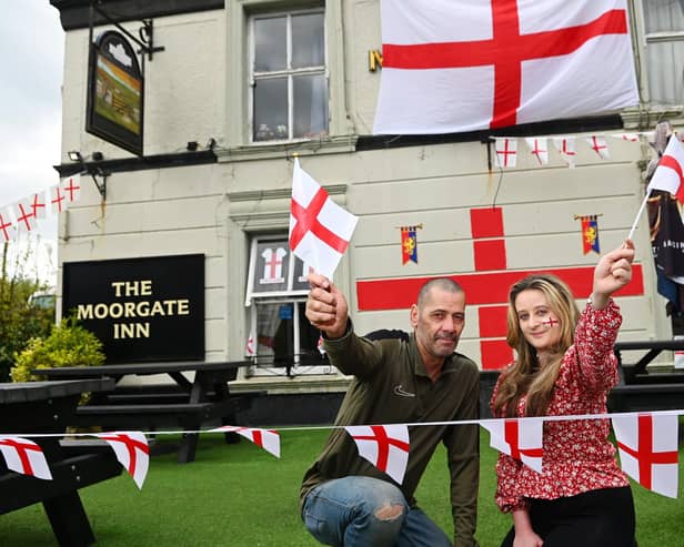 John Landon, left, landlord of The Moorgate Inn, Aspull, pictured with assistant manager Chelsea Kershaw, are getting ready to host a St George's Day party for the Royal British Legion on Saturday
