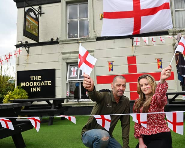 John Landon, left, landlord of The Moorgate Inn, Aspull, pictured with assistant manager Chelsea Kershaw, are getting ready to host a St George's Day party for the Royal British Legion on Saturday