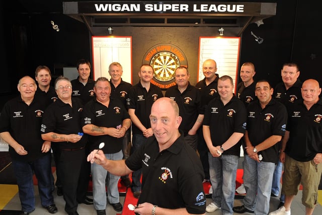 Darts team captain Ray Stone, foreground, pictured at the Sports Thomas Social Club, Comet Road, Marsh Green at the start of the new Super League Darts season
