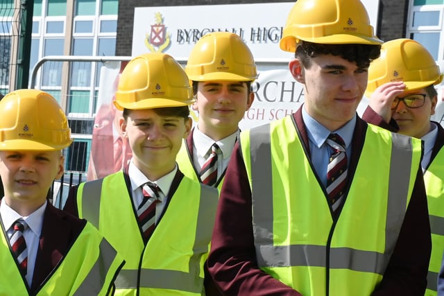 Pupils put on safety equipment for the ceremony.