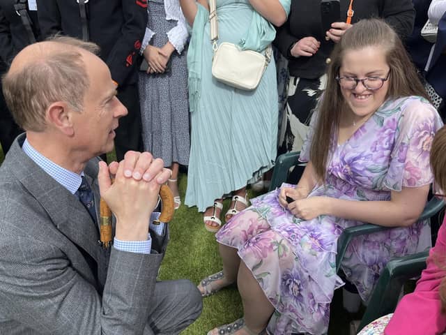 Prince Edward, the Duke of Edinburgh, speaks to trainees