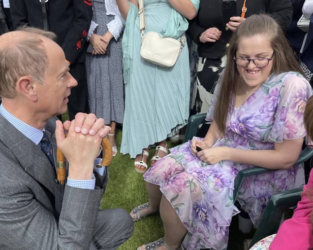Prince Edward, the Duke of Edinburgh, speaks to trainees