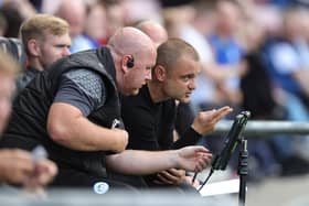 Shaun Maloney talks tactics with former first-team coach Stephen Crainey, who is now on the staff at Saturday's opponents Bolton