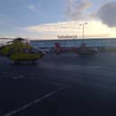 Two helicopters landed on the car park at Sainsbury's, in Marus Bridge, after the incident on Warrington Road