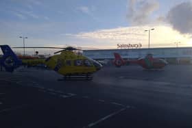 Two helicopters landed on the car park at Sainsbury's, in Marus Bridge, after the incident on Warrington Road