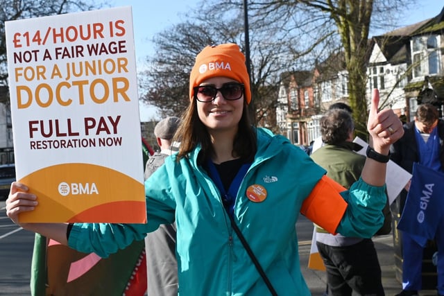 Junior doctor Behnaz Pourmohammadi on the picket line outside Wigan Infirmary