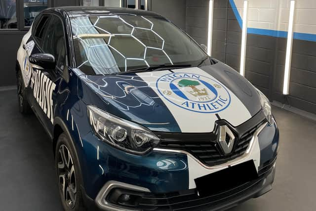 John Ronan with his new Latics-themed car