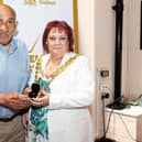 Billy Boston has already been showered with honours. There are four statues erected in his honour, he is an MBE and here the mayor of Wigan Debbie Parkinson is pictured presenting him with a Believe star. But fans want him to be knighted too