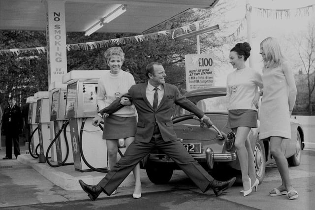 Entertainer Dickie Henderson opens the new Wigan Lane Service Station in 1969.