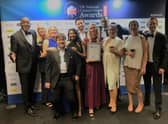 The Interact team at the UK National Contact Awards accompanied by host Ainsley Harriott (left)