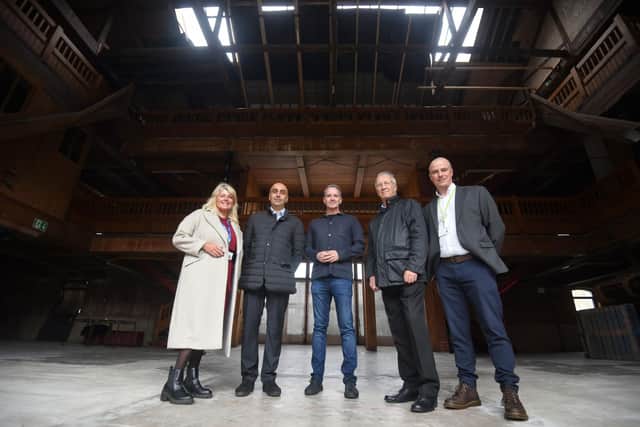 Making a tour of the Wigan Pier site: (left to right) Chief Executive of Wigan Council, Alison McKenzie-Folan, Step Places managing director Harinder Dhaliwal, GMCA night-time economy advisor, Sacha Lord, Leader of Wigan Council, David Molyneux and David Proctor assistant director for planning regeneration Wigan council.