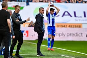 Ryan Lowe watches on as Latics went toe to tie with second-placed Wrexham