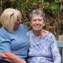 Dianne Cann and Norma Richardson enjoying a moment last summer.