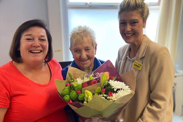 f Norma with Sharon Swift, Community Public Health Specialist Practitioner at Hindley Clinic (left) and Amanda Cheeseman, Assistant Director of Nursing (right)