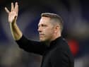Leam Richardson waved goodbye to Wigan Athletic on Thursday morning