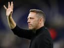 Leam Richardson waved goodbye to Wigan Athletic on Thursday morning