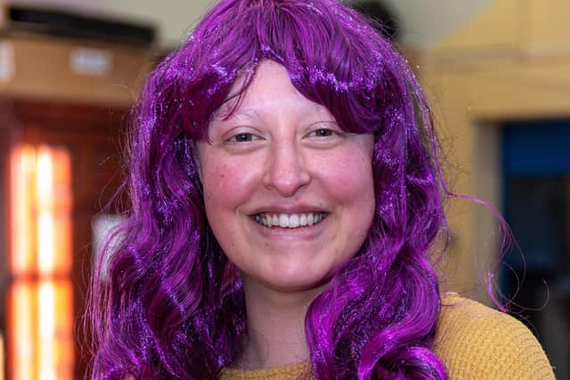 Angela in one of her famously colourful wigs during a previous money-spinner for Breast Cancer Now