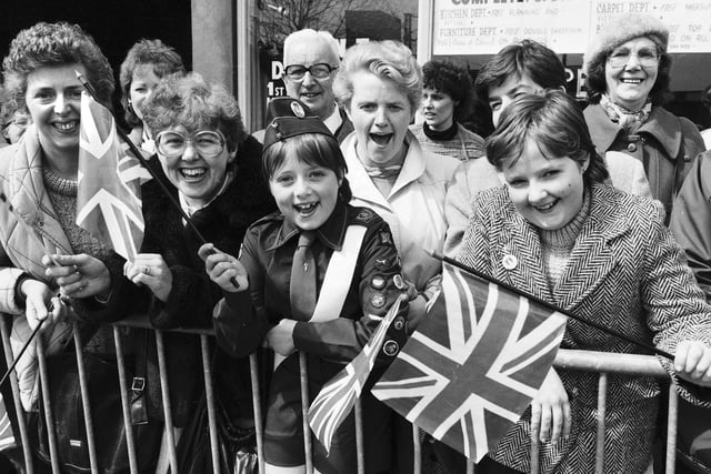 Royal fans wait for Prince Charles and Princess Diana to arrive at Wigan North Western station on route to Skelmersdale in 1986.