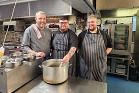 Left to right: Holland Hall's Andrew Thornley, sous chef, Kieran Brown chef de partie and Matt Ellis, executive chef get ready to prepare brawn