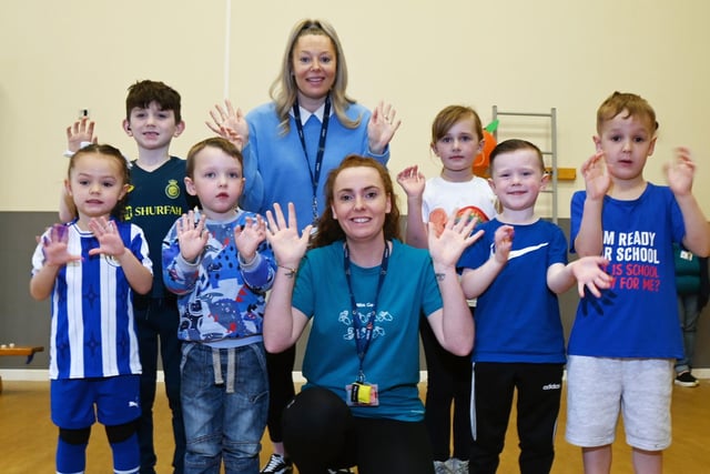 Staff and pupils at Hindley Green CP School celebrate British Sign Language Week.