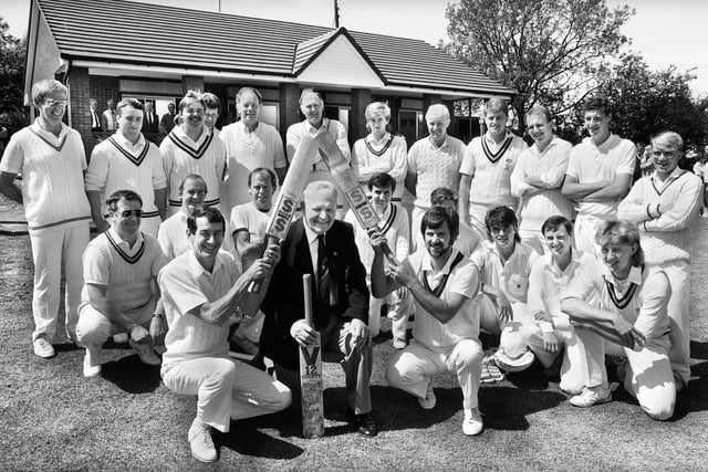 Dalton Cricket Club Life Member Joe Flaherty is given a guard of honour by Dalton captain Arthur Ball and Eccleston captain Tom Taylor after officially opening the club's new pavillion on Sunday 29th of May 1988. The teams competing played in the first match at Dalton in 1888.