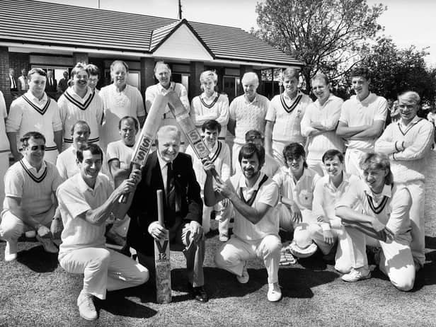 Dalton Cricket Club Life Member Joe Flaherty is given a guard of honour by Dalton captain Arthur Ball and Eccleston captain Tom Taylor after officially opening the club's new pavillion on Sunday 29th of May 1988.  The teams competing played in the first match at Dalton in 1888.