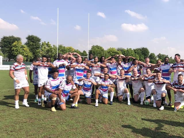 The JJ Legends do the Joining Jack salute at the Dubai 7s