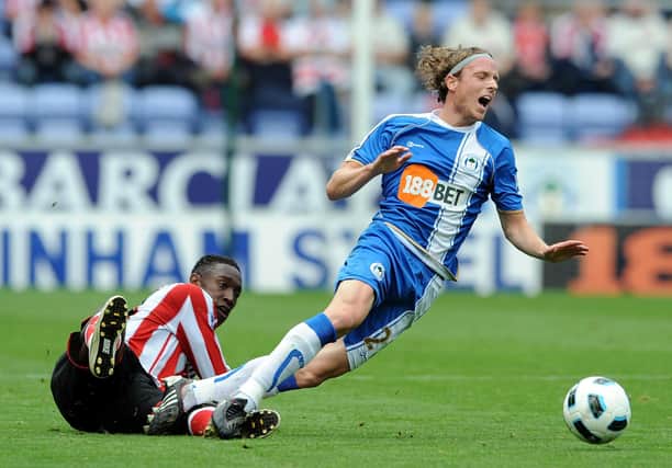 Ronnie Stam in action for Latics against Sunderland in September 2010