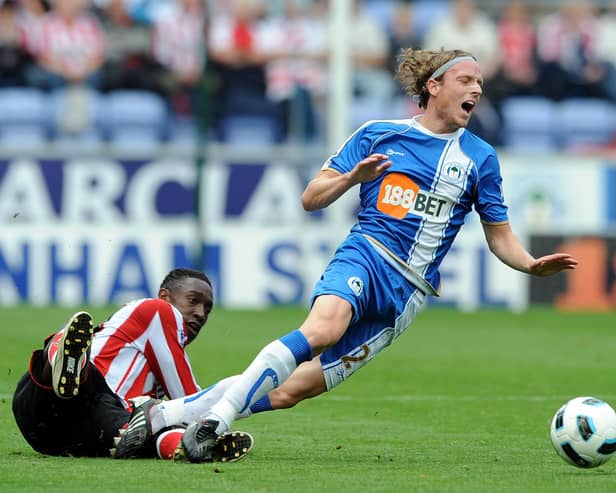 Ronnie Stam in action for Latics against Sunderland in September 2010