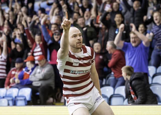 Picture by Allan McKenzie/SWpix.com - 07/05/2022 - Rugby League - Betfred Challenge Cup Semi Final - Wigan Warriors v St Helens - Elland Road, Leeds, England - Wigan's Liam Marshall celebrates scoring a try against St Helens.
