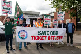 RMT leafleting passengers over the closure of ticket offices, including the one at North Western in Wigan.