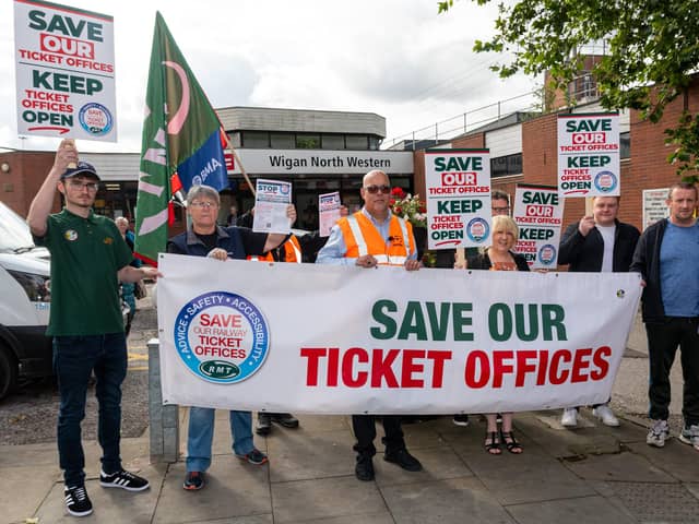 RMT leafleting passengers over the closure of ticket offices, including the one at North Western in Wigan.