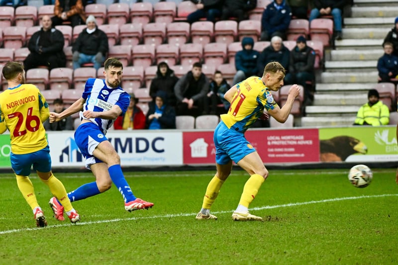 Came closest to breaking the deadlock in the first half and stuck to his task before being surprisingly replaced late on