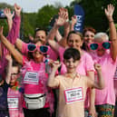 Fund-raisers dressed in pink for Cancer Research UK's Race for Life at Haigh Woodland Park