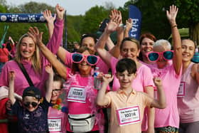 Fund-raisers dressed in pink for Cancer Research UK's Race for Life at Haigh Woodland Park
