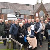 Members of the community and local councillors pictured outside the former St John The Baptist School, New Springs
