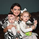 Lauren Whittaker with daughters eight-month-old Lyla and Sasha, three, have created a jar full of activities to do every day, while their dad is away on military deployment.  She has been documenting these activities on TikTok and inspired other families to do similar things.