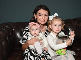 Lauren Whittaker with daughters eight-month-old Lyla and Sasha, three, have created a jar full of activities to do every day, while their dad is away on military deployment.  She has been documenting these activities on TikTok and inspired other families to do similar things.
