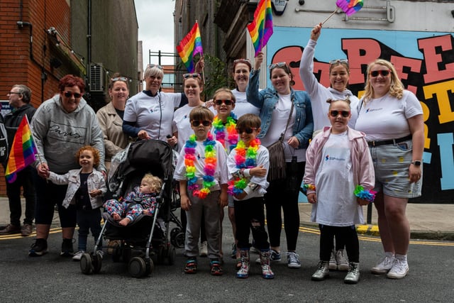 Wigan Pride parade through the streets of Wigan