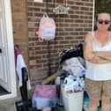 Sue Andrews, 52, standing outside her home hit by floods on Stirling Close in Leigh