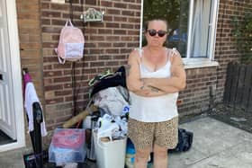 Sue Andrews, 52, standing outside her home hit by floods on Stirling Close in Leigh