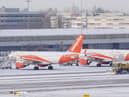 Snowploughs clearing snow at Manchester Airport. Picture by Martin Rickett. Credit: PA Wire/PA Images