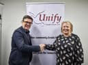 Greater Manchester Mayor Andy Burnham with Angela Fishwick, chief executive of Unify Credit Union in Wigan