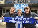 FA Cup final 2013 at Wembley  - Wigan Athletic v Manchester CityWigan Athletic fans, from left, James Mitchell, Martin Johnson and James Mitchell, show their support for the Latics, at The Torch pub, Wembley.