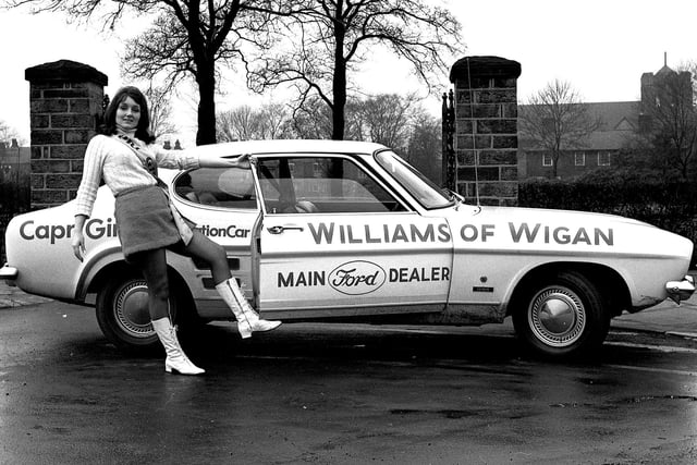 RETRO 1969 - The new Ford Capri arrives in Wigan with Williams' Capri Girl promoting its sporty looks.